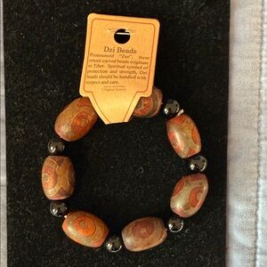 Bracelet of Dzi beads Earth tones